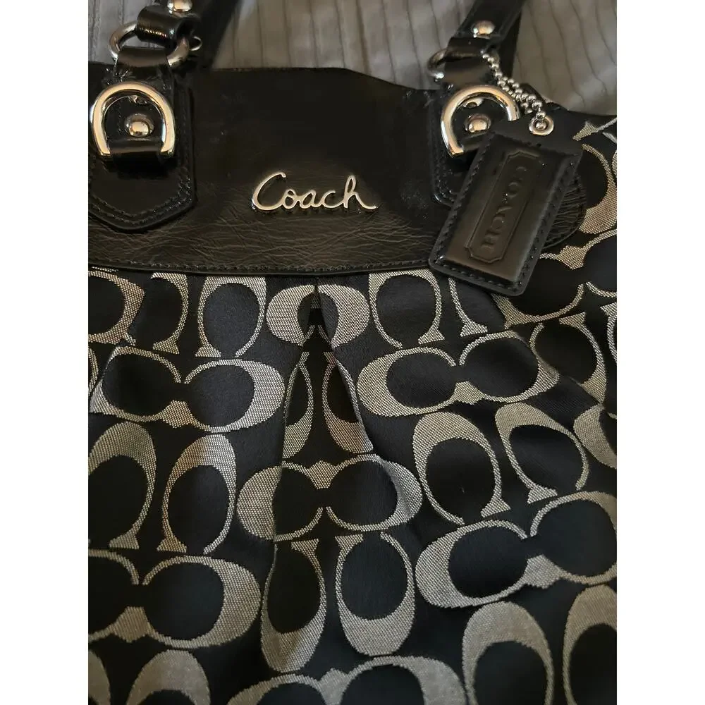 Coach Ashley Signature Canvas Handbag in Black and Gray.
